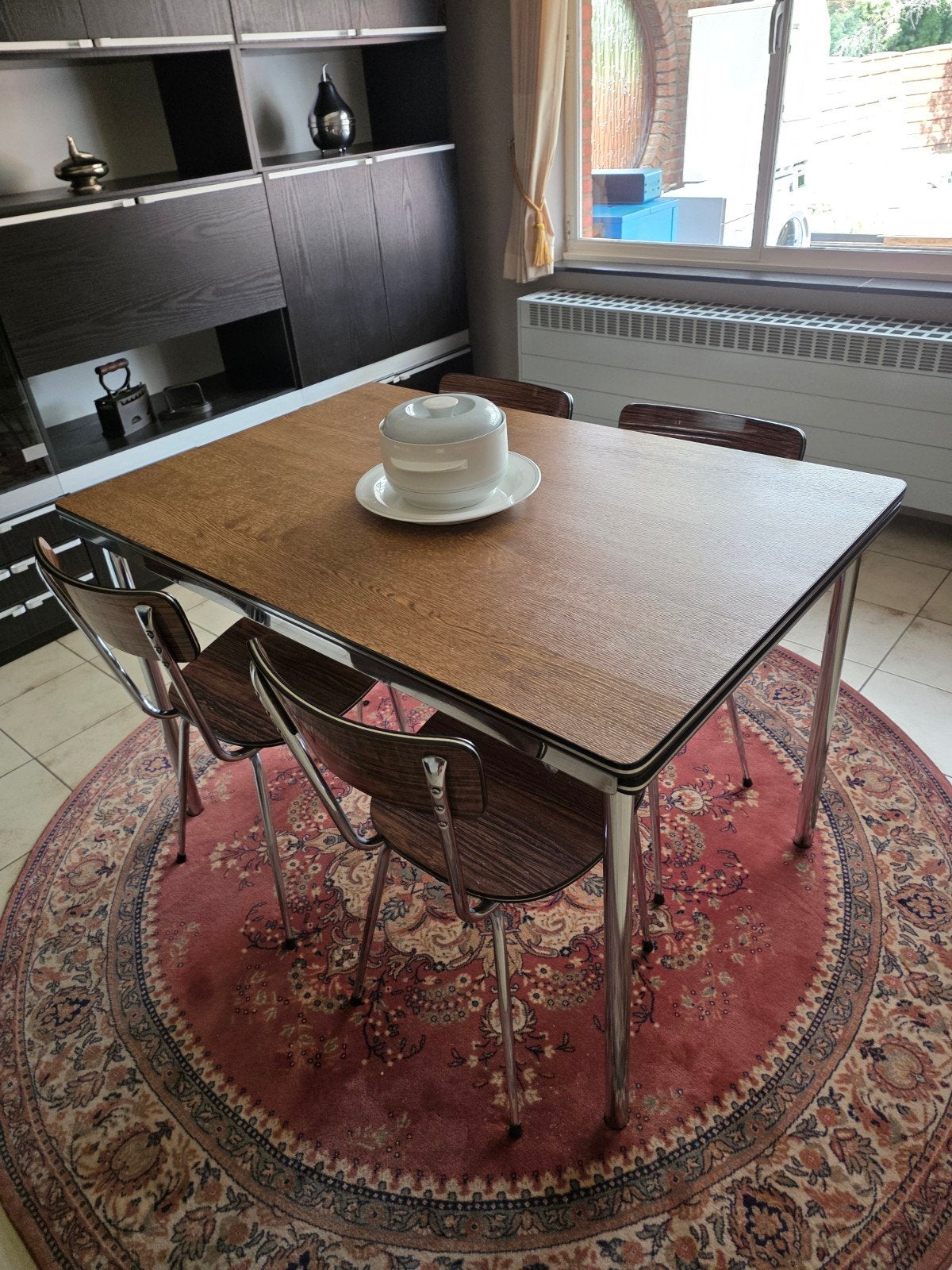 stevige en uittrekbare tafel en 4 stoelen, Ophalen
