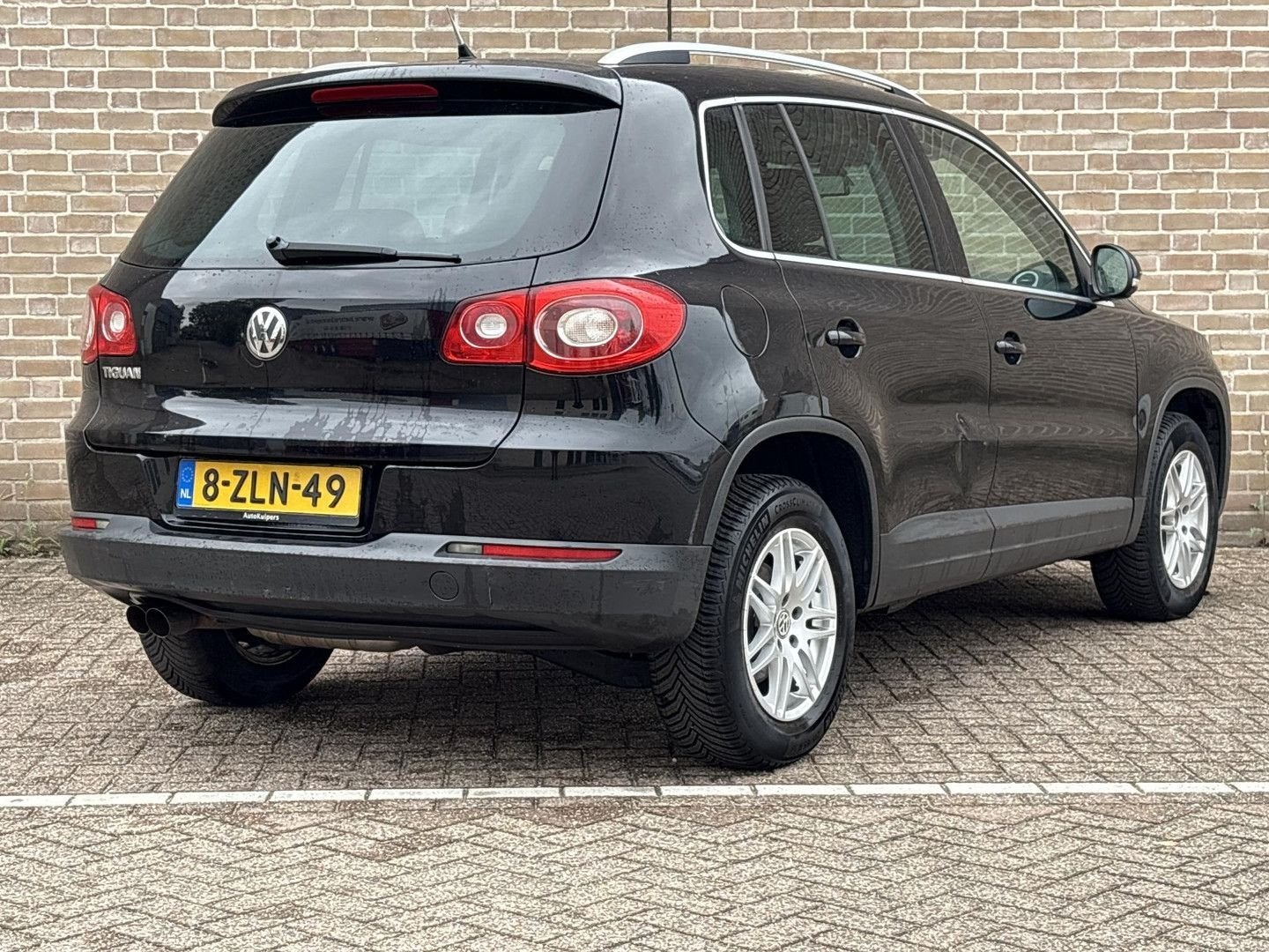 Volkswagen Tiguan 1.4 TSI Sport&Style 4Motion, Auto's, Zwart, Zwart, 185 g/km, Bedrijf