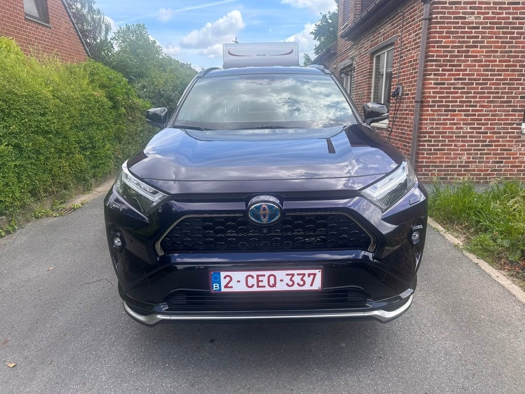 Toyota RAV4 2.5 Plug-in Hybrid AWD Style Plus – Dark Blue, Auto's, Toyota, Automaat, Lichtsensor, Blauw, Leder