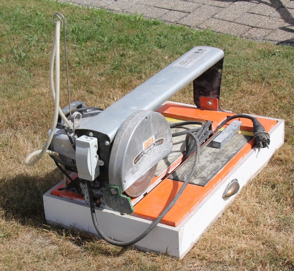 Zaagmachine voor vloer en tegels met diamantzaag, Ophalen