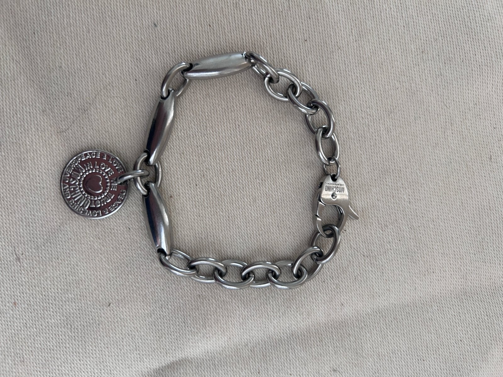 Moschino mesh-armband 20 cm zilverkleurig metaal, Ophalen of Verzenden, Zo goed als nieuw, Zilver, Zilver