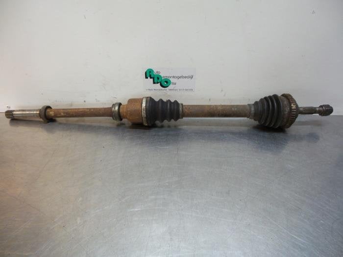 Arbre de transmission avant droit d'un Peugeot 206, -, 3 mois de garantie, Utilisé, -