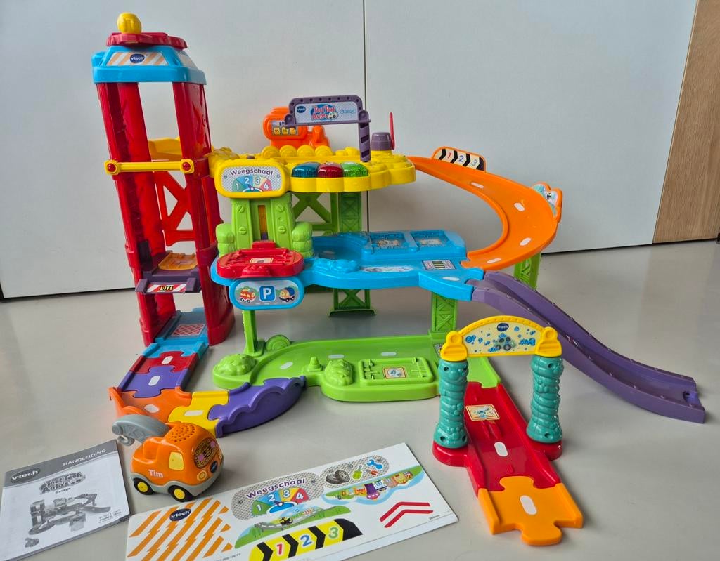 Vtech toet toet auto garage - grote garage + extra autootjes, Kinderen en Baby's, Ophalen