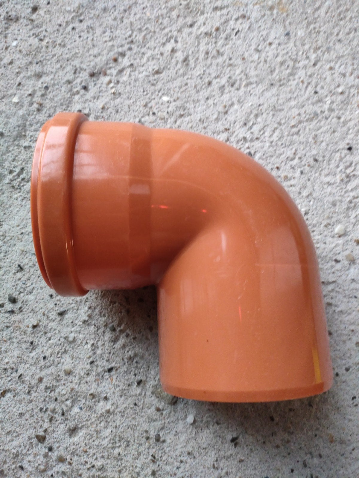 Bocht 90 100mm aan de binnenkant van de oranje afvoerbuis, Afvoer, PVC, Nieuw, Ophalen of Verzenden