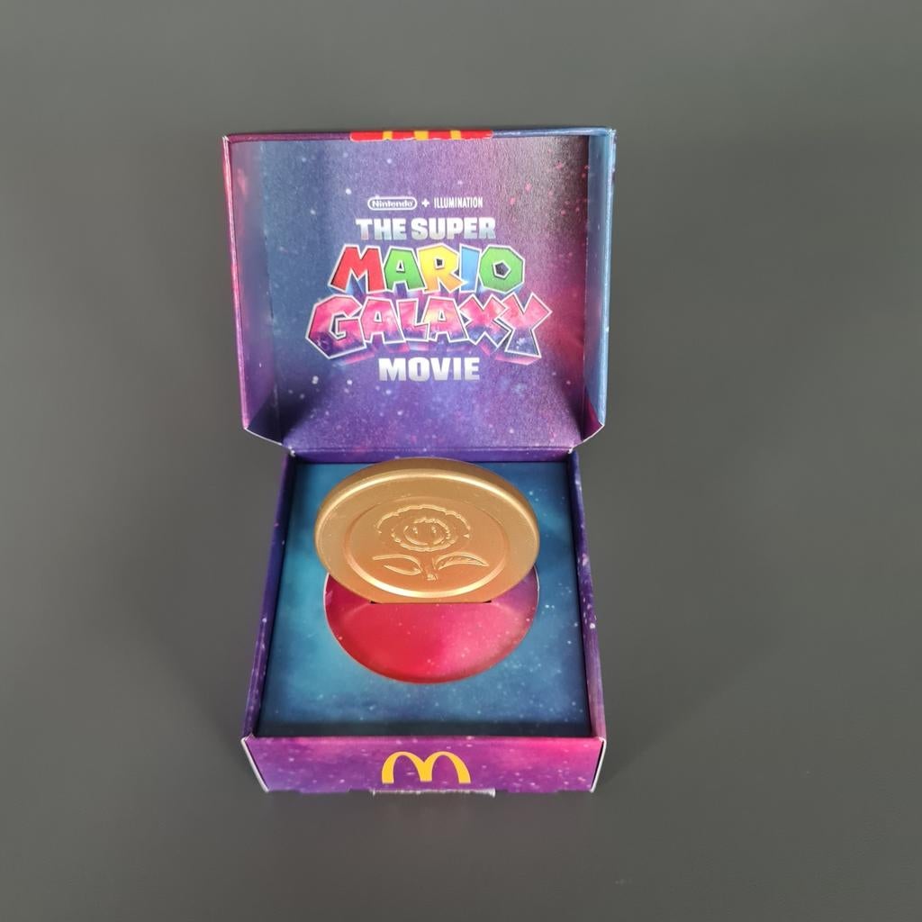 Mc Donalds Mario Galaxy munt., Games en Spelcomputers, Games | Overige, Ophalen of Verzenden, Zo goed als nieuw, Avontuur en Actie