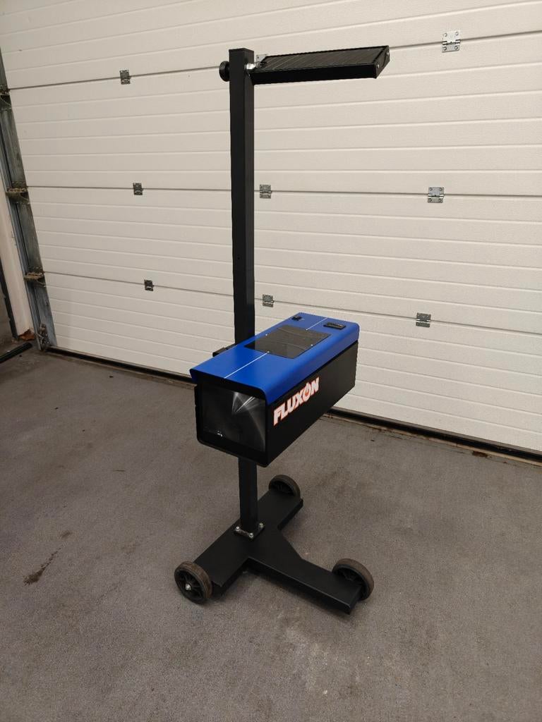 Fluxon auto koplampregelapparaat, Enlèvement
