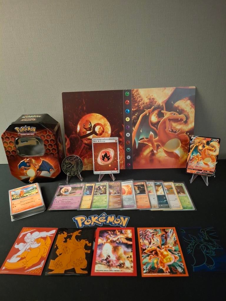 Charizard cadeau set ideaal als geschenk!, Hobby & Loisirs créatifs, Jeux de cartes à collectionner | Pokémon, Comme neuf, Enlèvement ou Envoi
