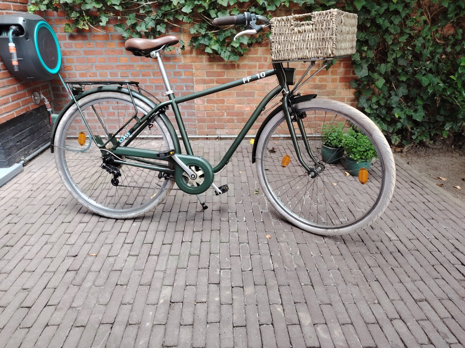 herenfiets met bagage mand, Ophalen