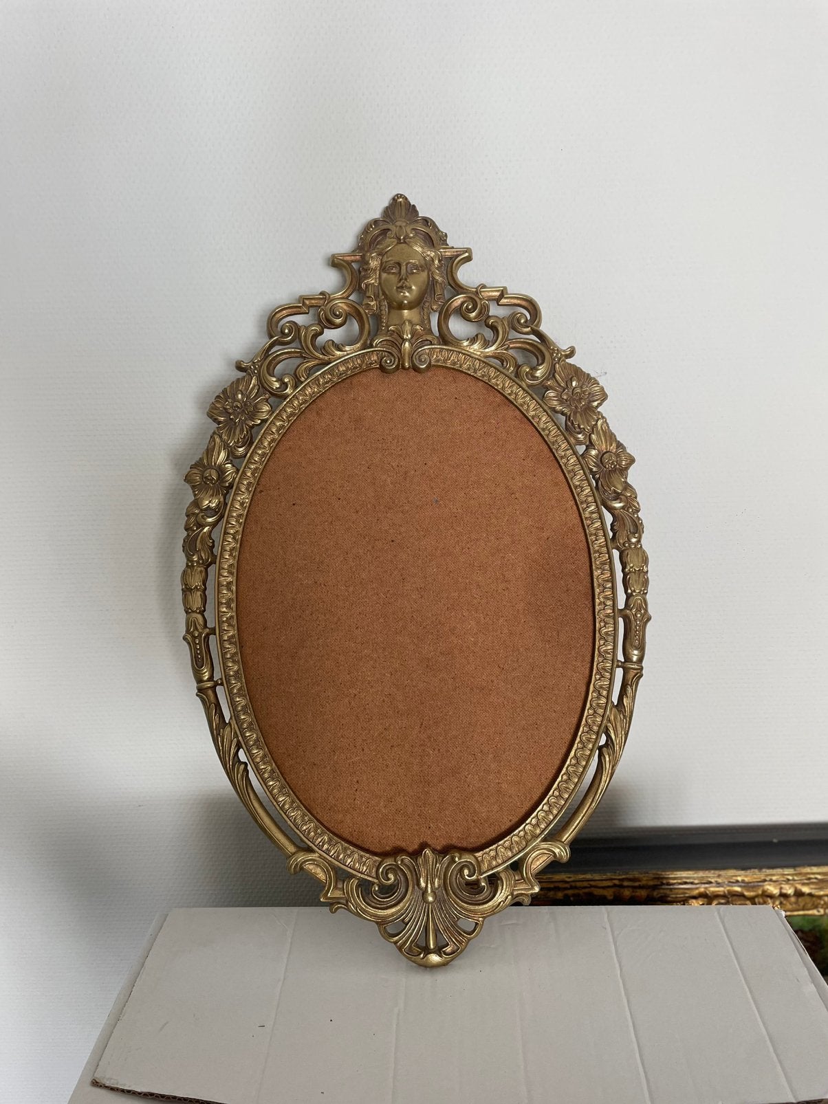 Kader voor spiegel of schilderij, Ophalen