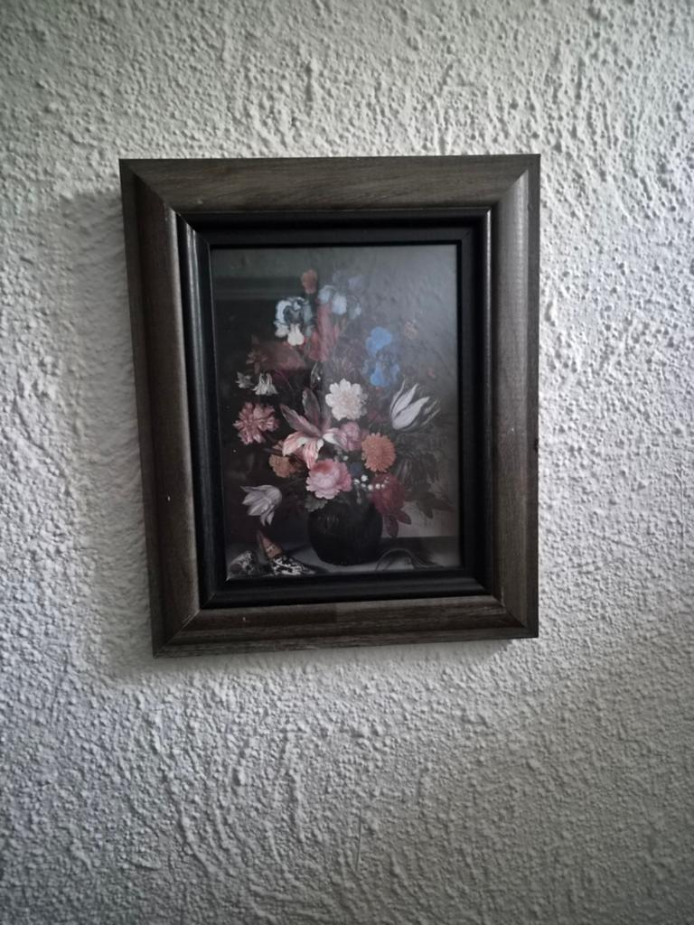 Kader met bloemen, Ophalen