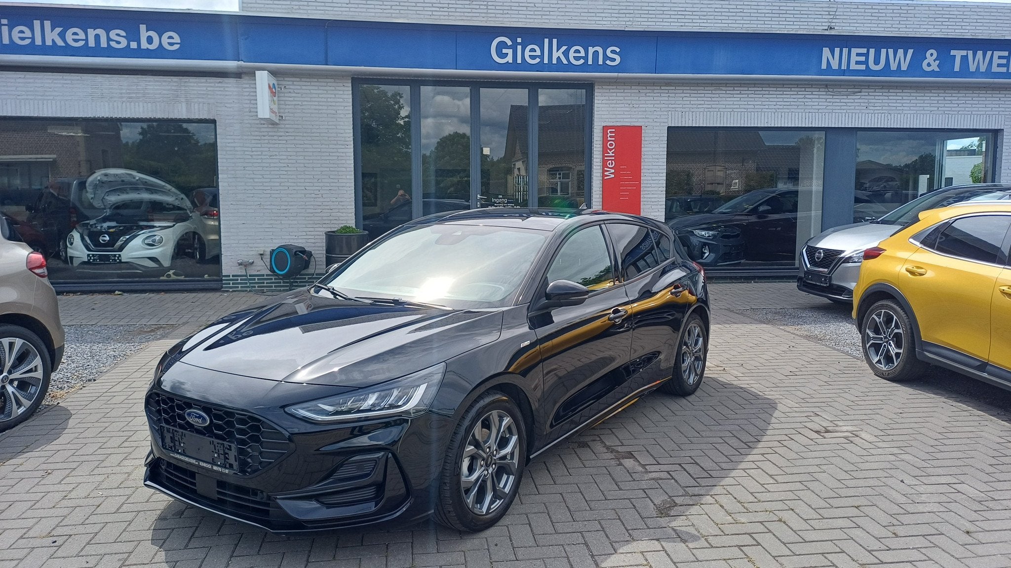 Ford Focus 1.0 Ecoboost MHEV ST-LINE *11000km.!*, Stof, Gebruikt, Euro 6, Zwart