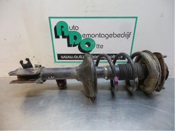 Schokdemperpoot links-voor van een Kia Sportage (Sportage 05, -, -, Ophalen of Verzenden, -