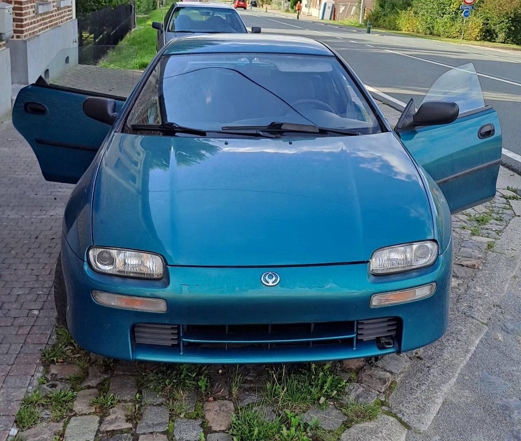 Mazda 1997 15CC, Autos, Mazda, Particulier, Airbags, Vitres électriques, Peinture métallisée, Essence, Euro 2, Hatchback, 5 portes