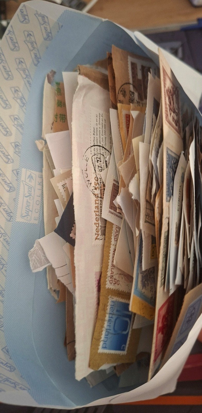 Geplakte postzegels, Ophalen