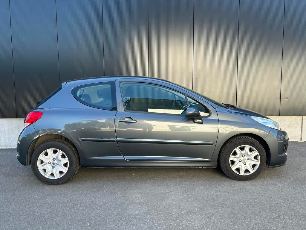 Peugeot 207+ 1.4i / 1ste eigenaar / 30.000km / Airco, Auto's, Peugeot, Euro 5, Stof, Electronic Stability Program (ESP), Zwart