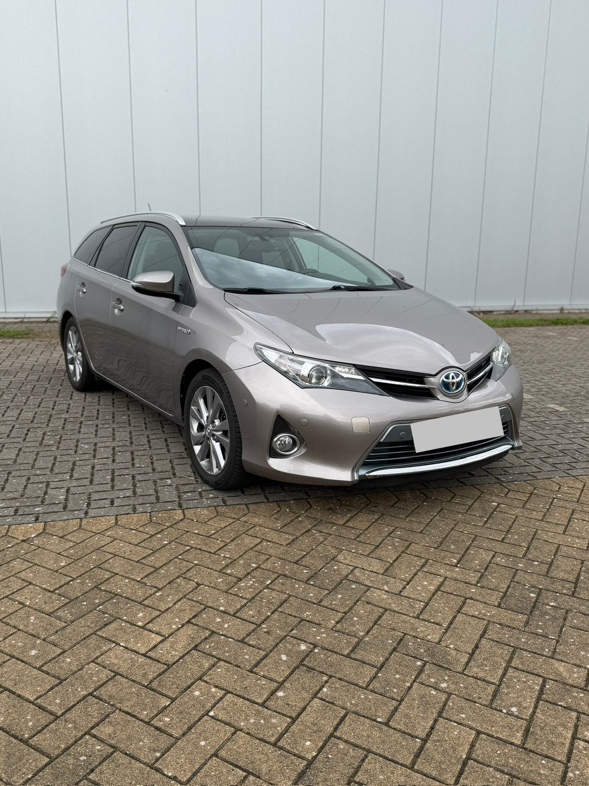 Toyota Auris Hybride, Auto's, Zwart, Leder en Stof, Bedrijf, Break