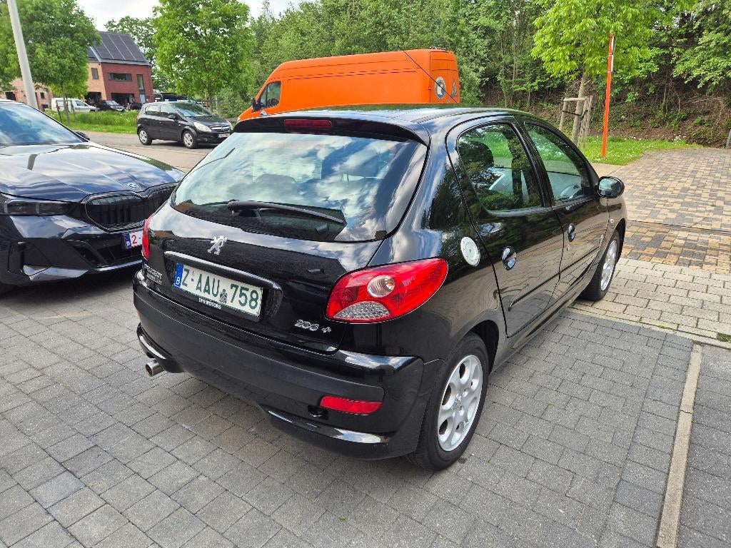 Peugeot 206+ 1.1benzine BJ2012 110.000kms AC 5deurs, Auto's, Peugeot, Voorwielaandrijving, Stof, Zwart, 4 cilinders
