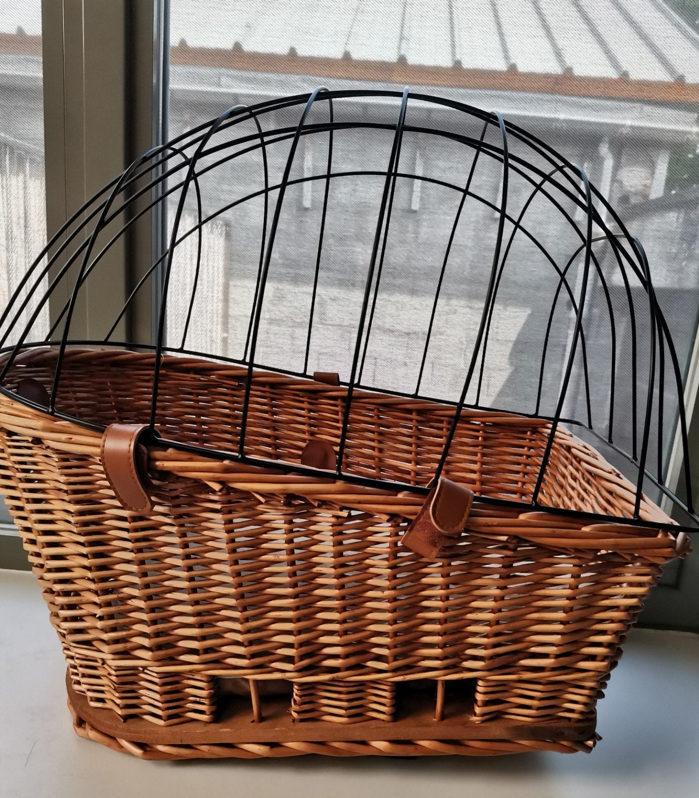 Hondenmand voor op fiets, Ophalen