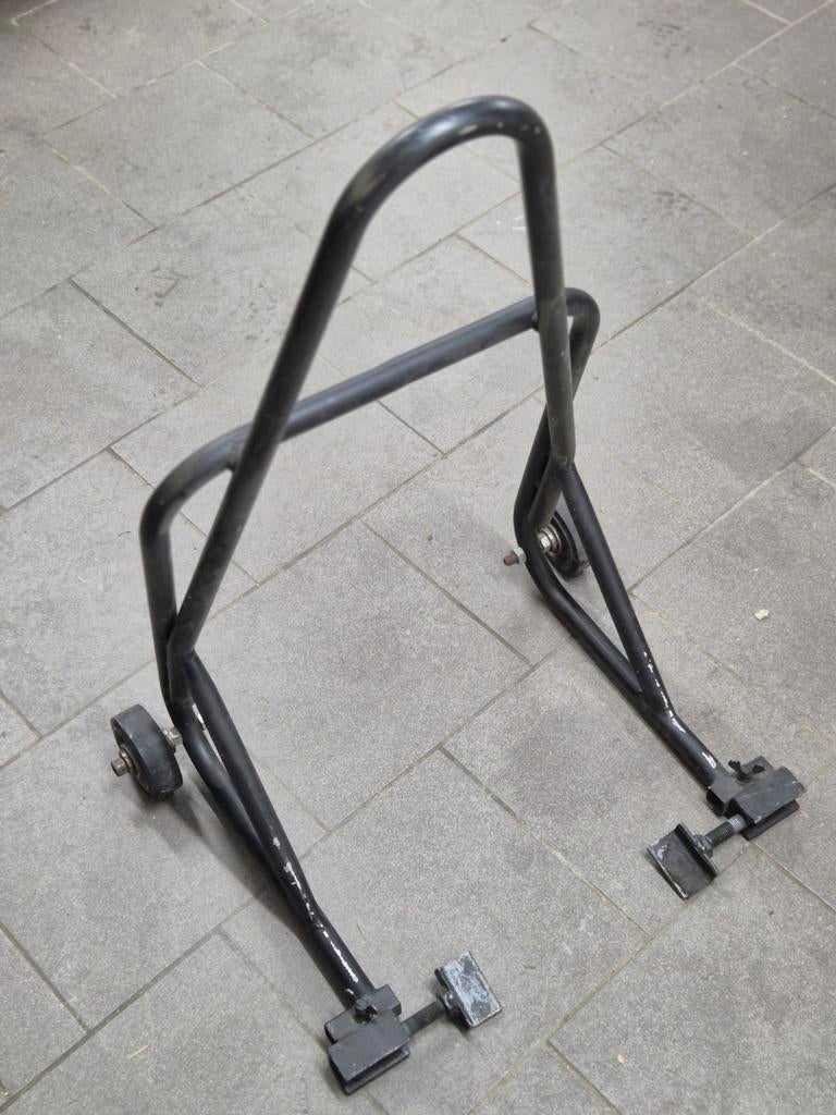 Paddock stand moto., Ophalen