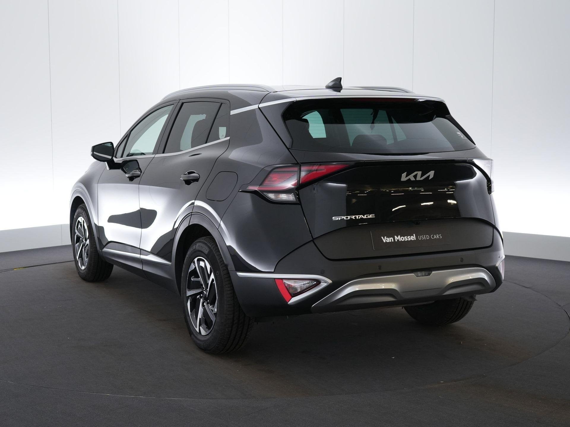Kia Sportage 1.6 T-GDi 48V 7DCT Pulse, Auto's, Stof, Gebruikt, 4 cilinders, 1650 kg
