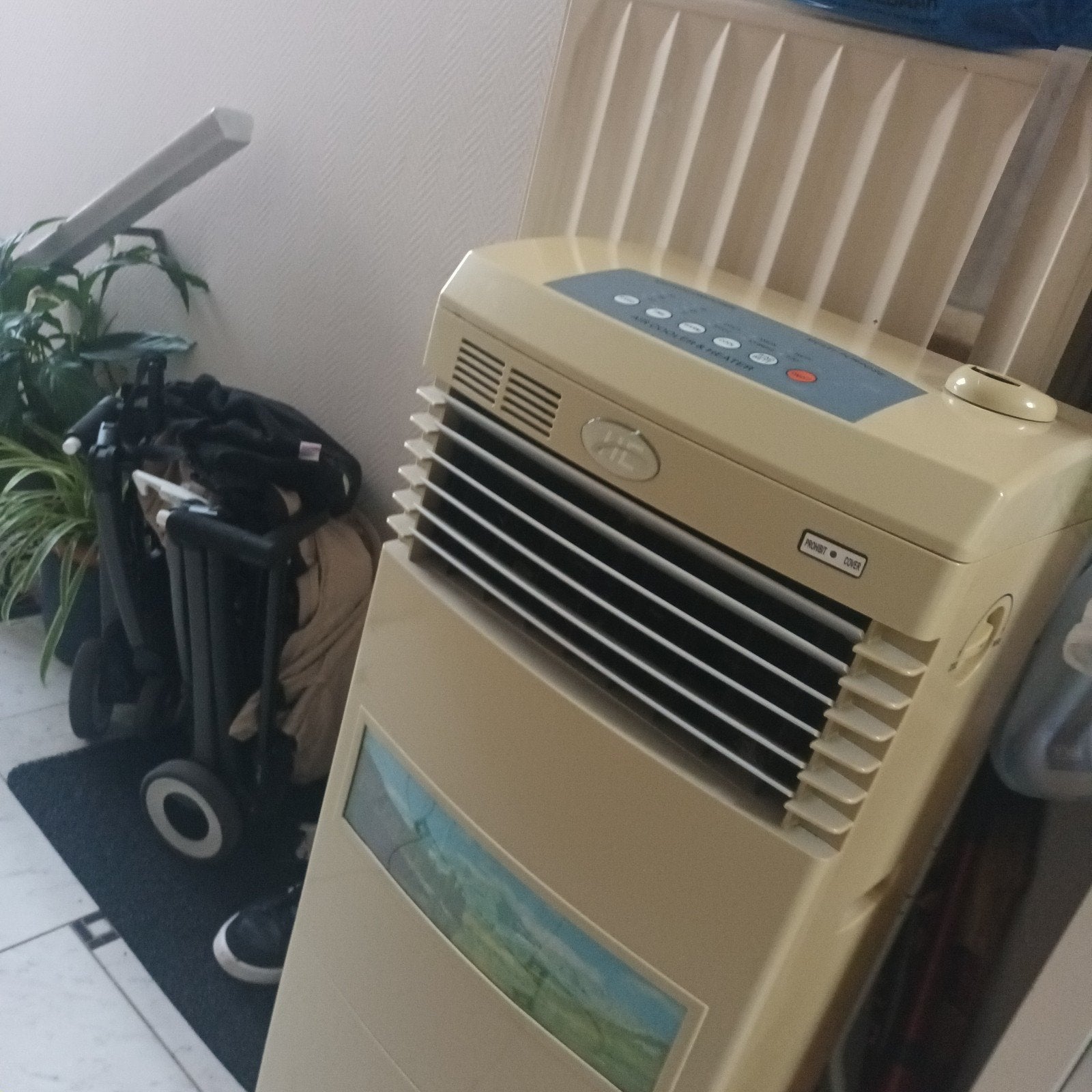 1 Climatiseur  2 en 1. Froid et chaud fonctionne avec eau, Enlèvement