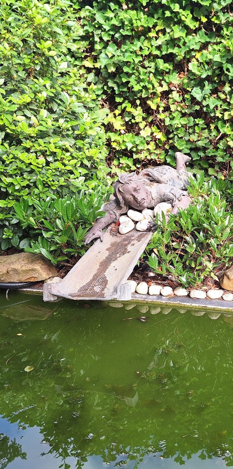 Bronzen beeld liggend meisje, Tuin en Terras, Ophalen