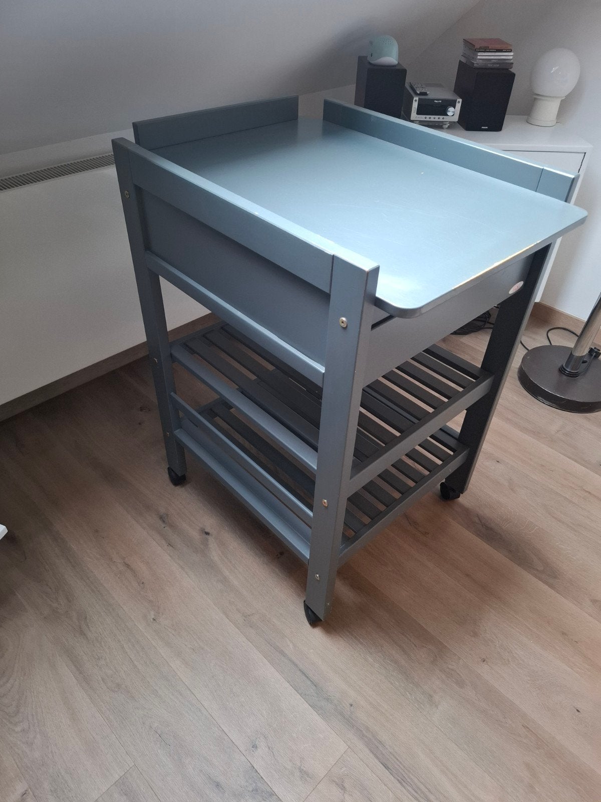verzorgingstafel van het merk troll, Ophalen
