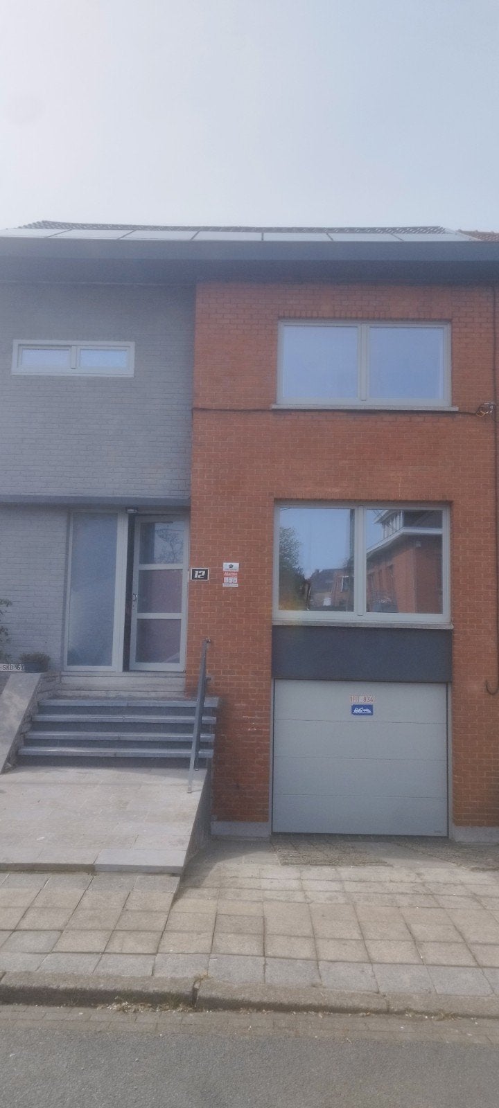 porte sectionnelle de garage électrique, Ophalen