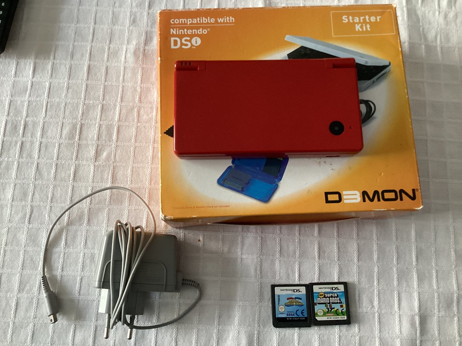 Nintendo dsi en mario games, Games en Spelcomputers, Spelcomputers | Nintendo DS, Ophalen of Verzenden, Zo goed als nieuw, Dsi