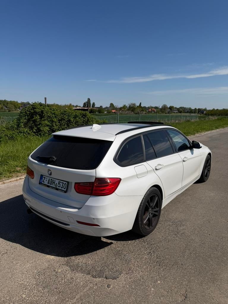 BMW 318i Touring Sportline 2014 Leder Pano, Auto's, Euro 6, Leder, Climate control, Particulier