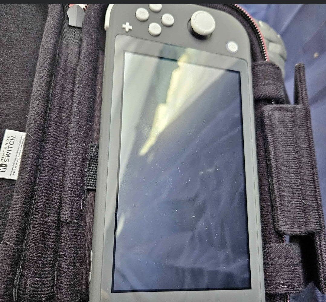 Switch lite grey (free micro sd kaart 128gb), Ophalen, Grijs, Zo goed als nieuw, Met beschermhoes of tas