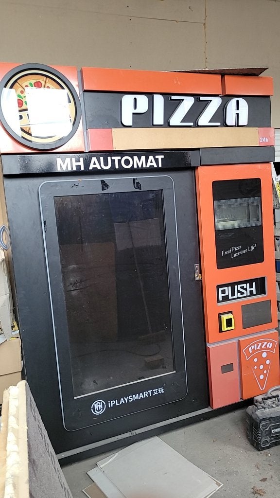 Distributeur a pizza, Ophalen