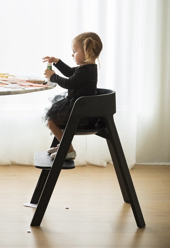 Nieuwe Stokke steps eetstoel (zwart), Ophalen, Zo goed als nieuw