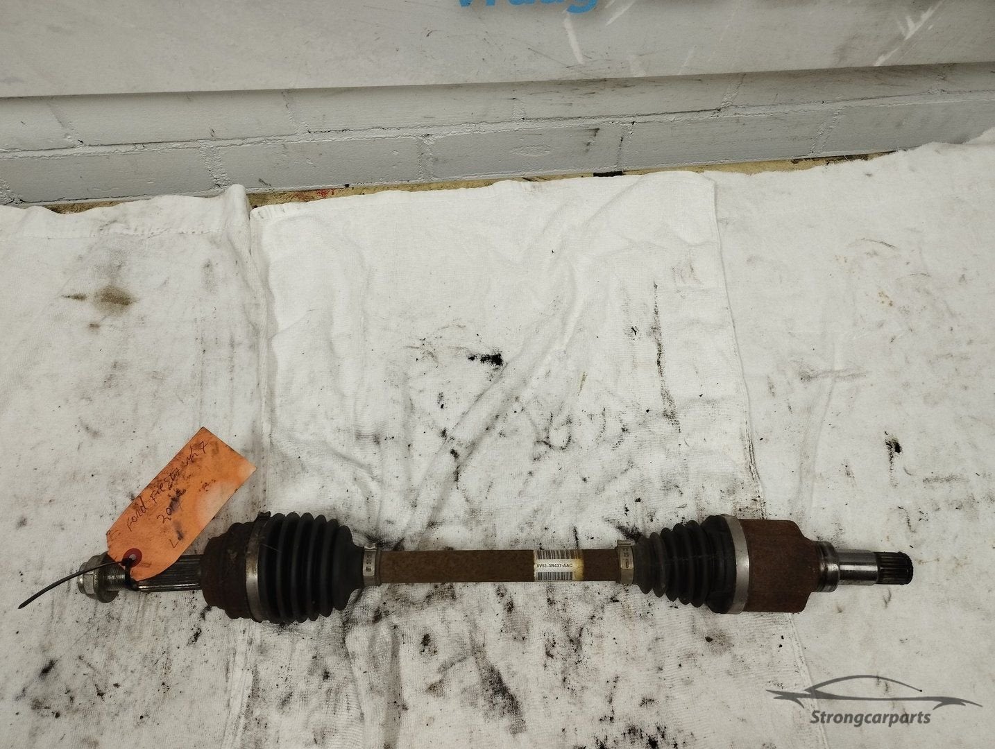 aandrijfas Ford Fiesta links 8V513B437AAC, Auto-onderdelen, Gebruikt, -, -, Ophalen of Verzenden