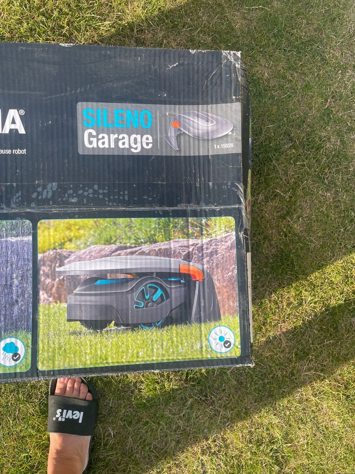 Garage robotmaaier Gardena, Ophalen