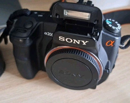 Sony alpha 200 werkt goed maar LCD-scherm moet gerepareerd w, Ophalen of Verzenden, Zo goed als nieuw, Sony