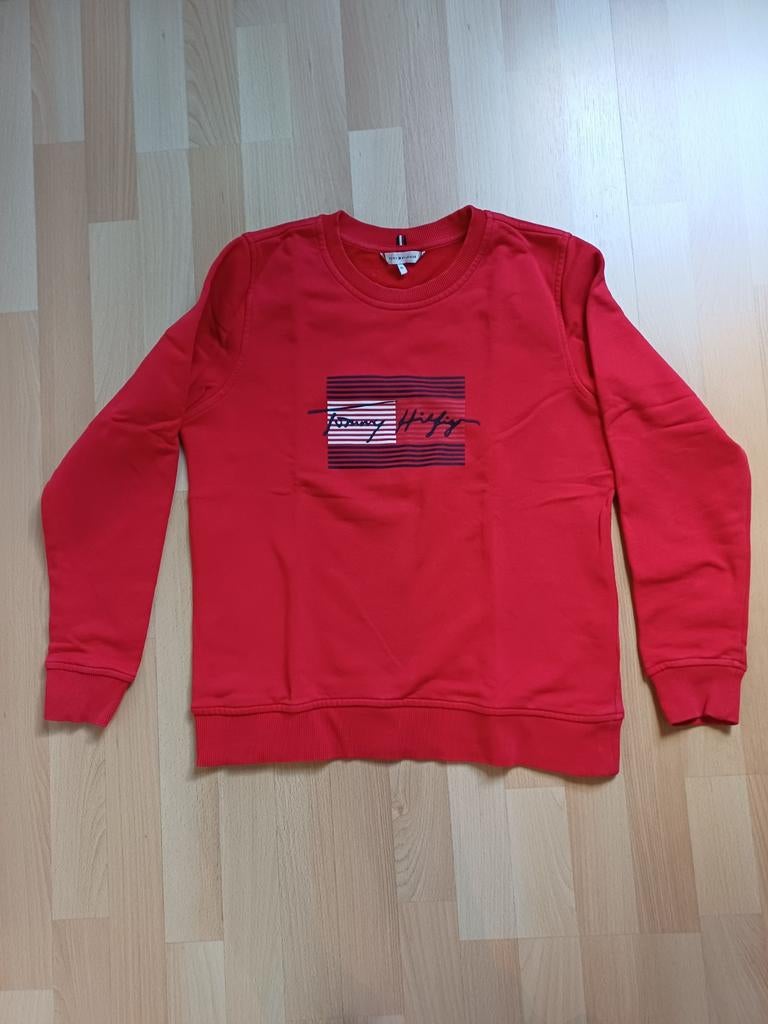 Pull Tommy Hilfiger, Enlèvement