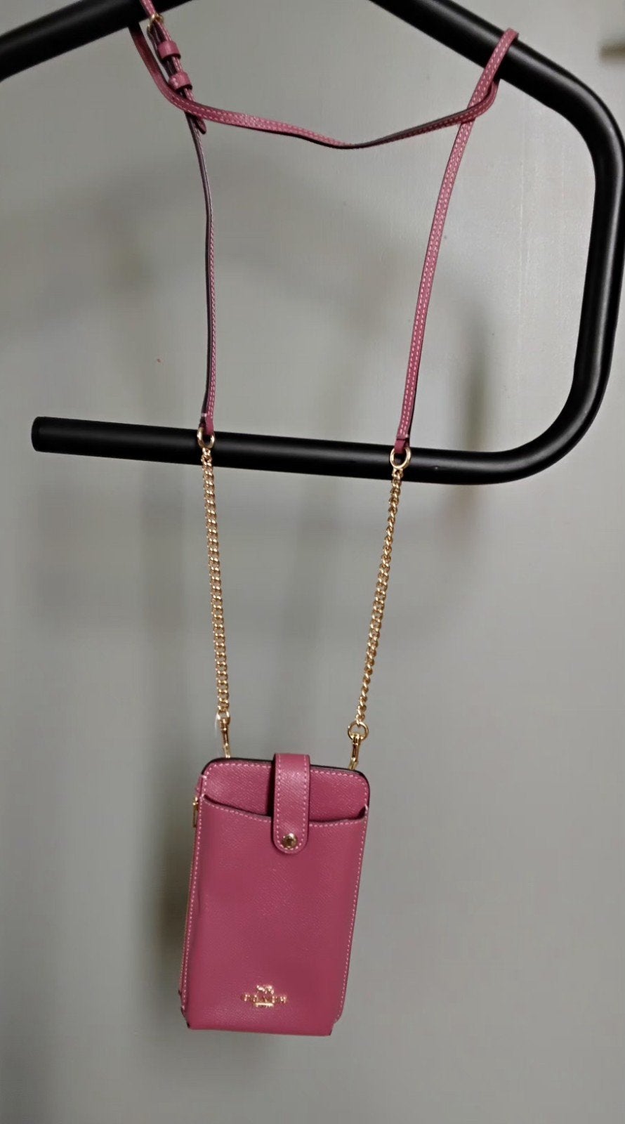 Coach Noord/Zuid telefooncrossbodytas, Ophalen