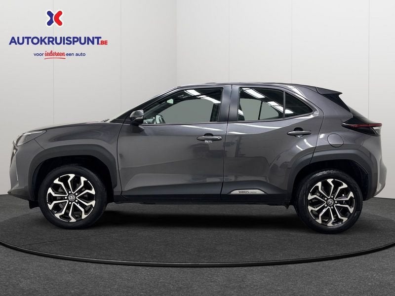 Toyota Yaris Cross 1.5Hybrid Dynamic Plus CVT, Auto's, Stof, Gebruikt, 4 cilinders, 1490 cc