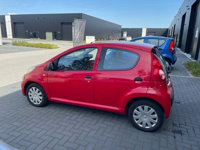 Peugeot 107 1.0I Petit Filou, 62855 KM, Keuring + Garantie, Auto's, Voorwielaandrijving, Stof, 50 kW, https://public.car-pass.be/vhr/9515b132-1820-4b5f-b915-94e784de7da1
