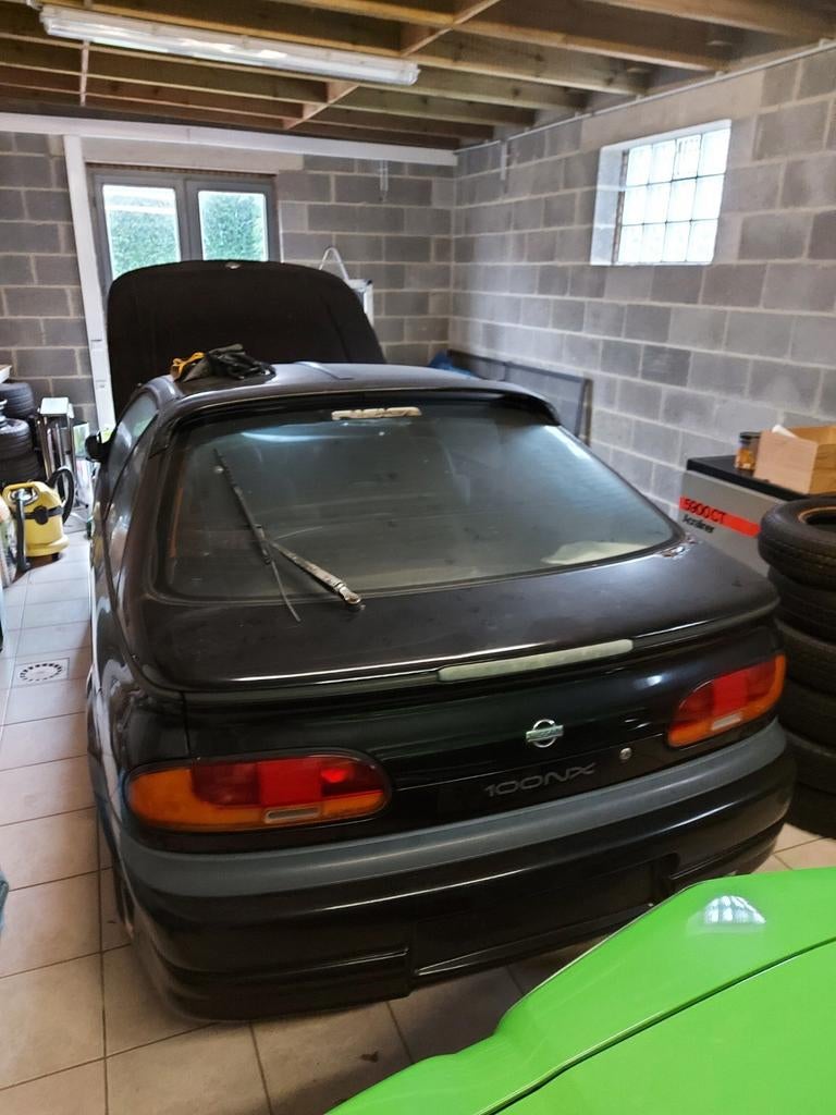 A vendre Nissan 100NX à refaire., Auto's, Nissan, Particulier, 100 NX, Benzine, Coupé, 3 deurs, Handgeschakeld, Zwart, Zwart, Stof