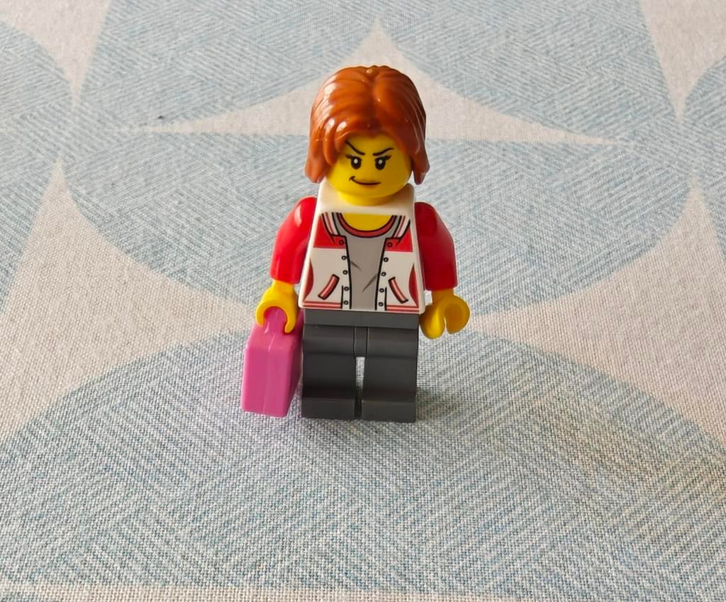 Lego city figuur met roze koffer, Ophalen of Verzenden, Zo goed als nieuw, Lego