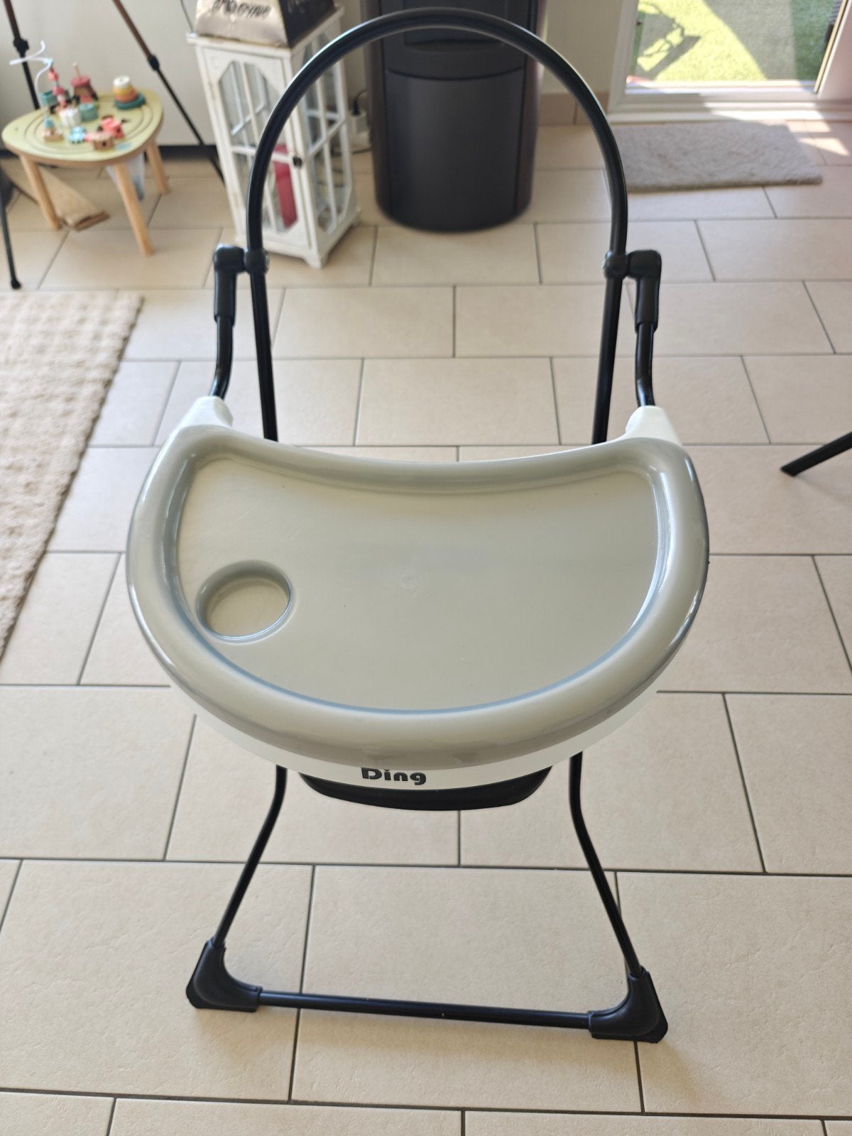 Hoge eeltstoel baby zonder de bekleding, Ophalen