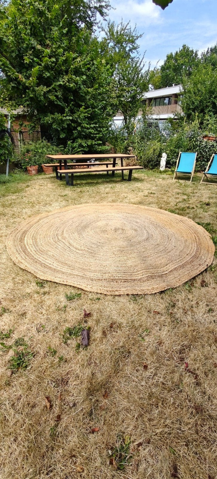 Terrastapijt rond in Jute, Ophalen