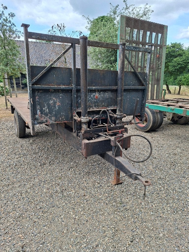 Platte kipwagen, Zakelijke goederen, Ophalen