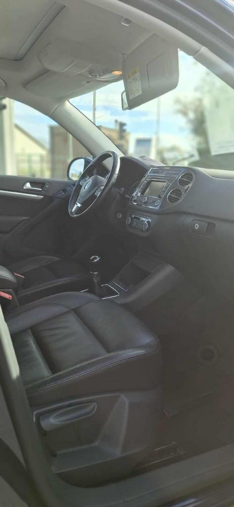 Volkswagen Tiguan Sport & Style BMT (bj 2015), Auto's, Gebruikt, Blauw, Tiguan, 1390 cc