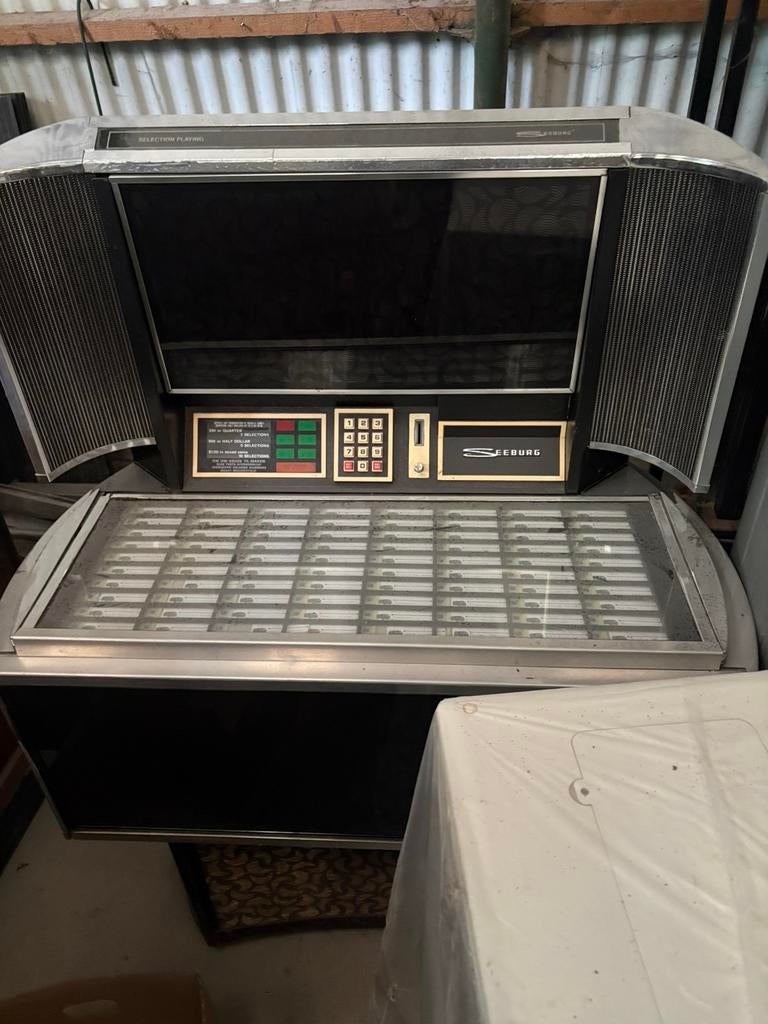 Jukebox seeburg, Ophalen, Seeburg
