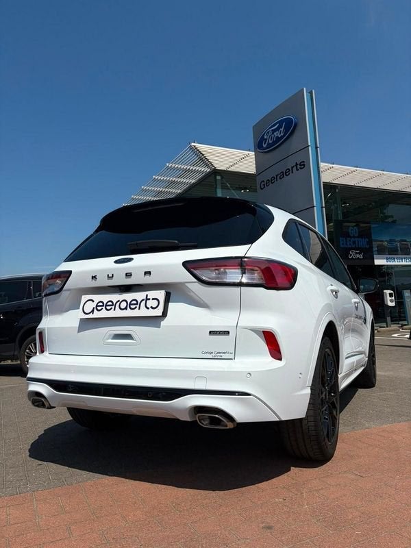 Ford Kuga ST-Line X 2.5i PHEV 225pk/165kW - Auto, Auto's, Ford, Gebruikt, Zwart, Leder en Stof, Wit