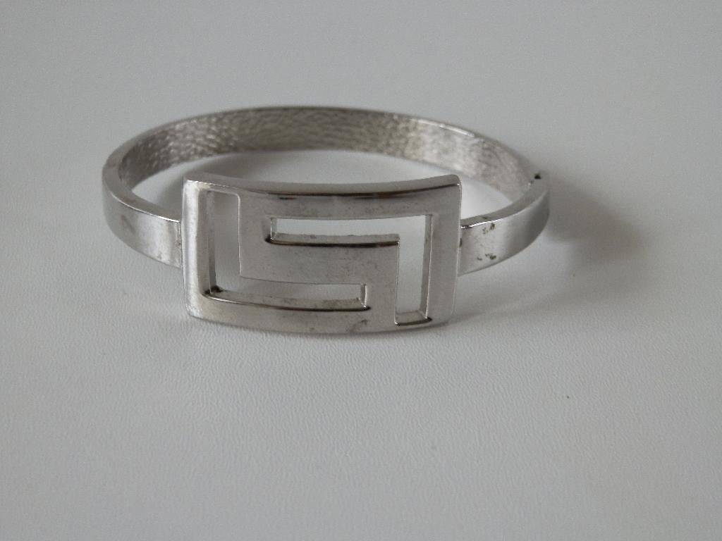 Versace slavenarmband., Handtassen en Accessoires, Armbanden, Ophalen of Verzenden, Zo goed als nieuw, Zilver, Overige materialen