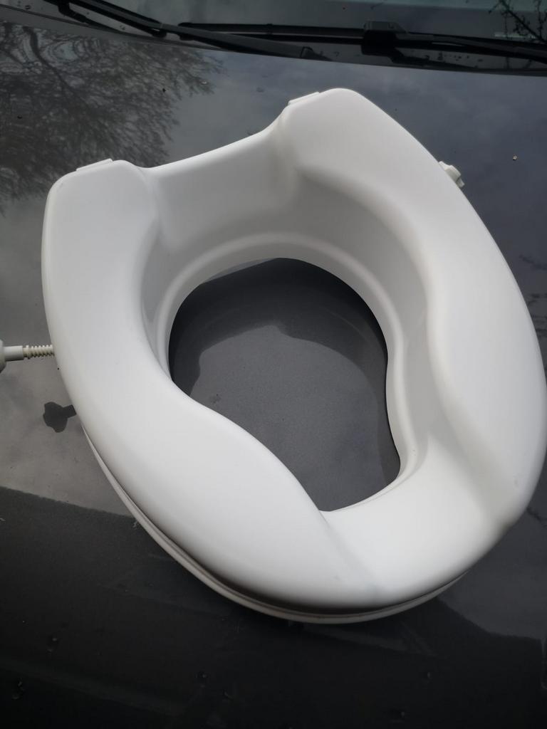 Verhoogde wc bril, Ophalen
